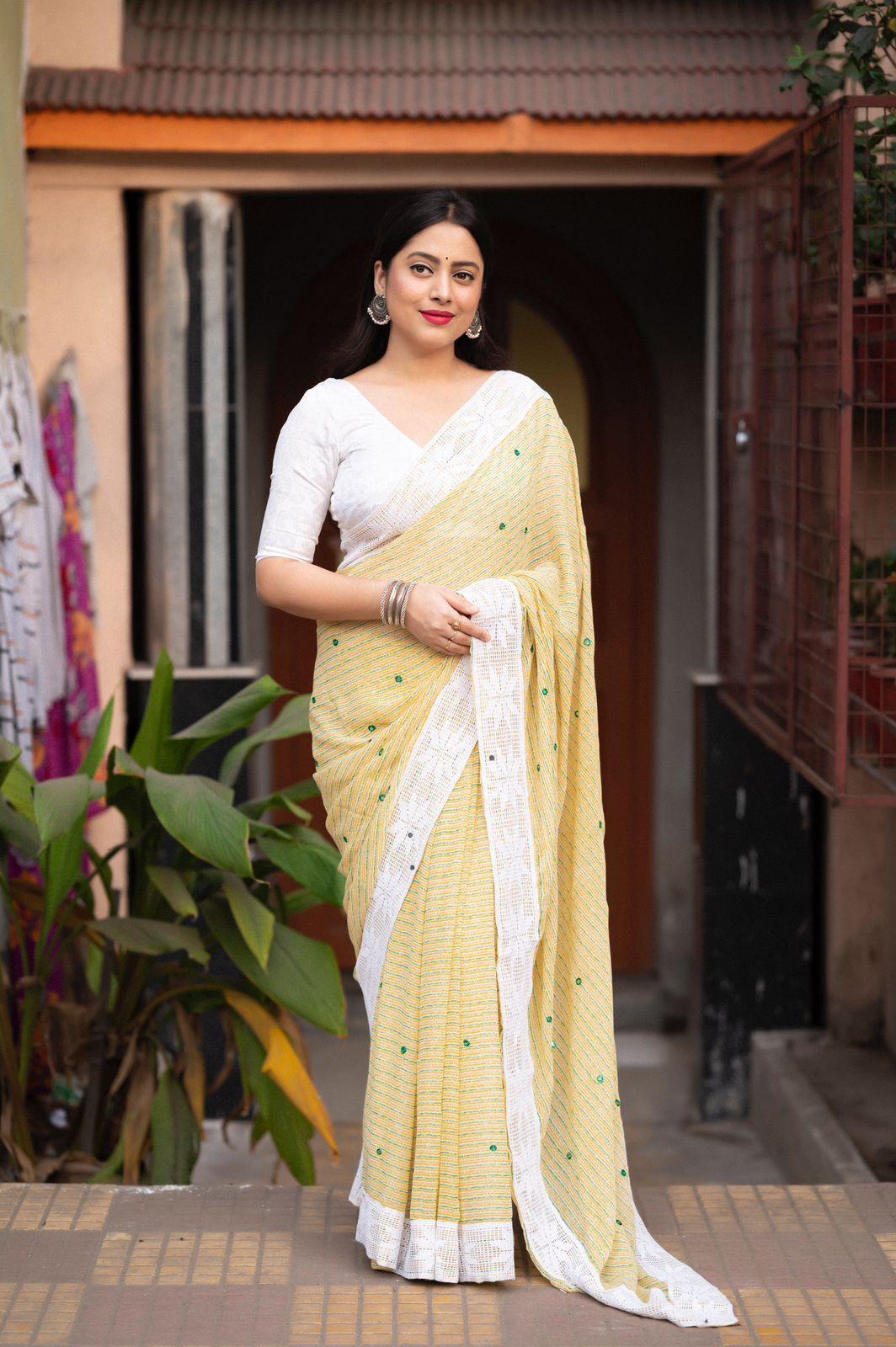 Lemon Poly Georgette Ethnic Motifs Saree with Unstitched Blouse - Hiral Fashion | Swadesiicart