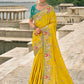 Monjolika Fashion Yellow Color Banarasi Silk Blend Embroidered With Heavy Patchwork Border Saree With Contrast Blouse | Swadesiicart
