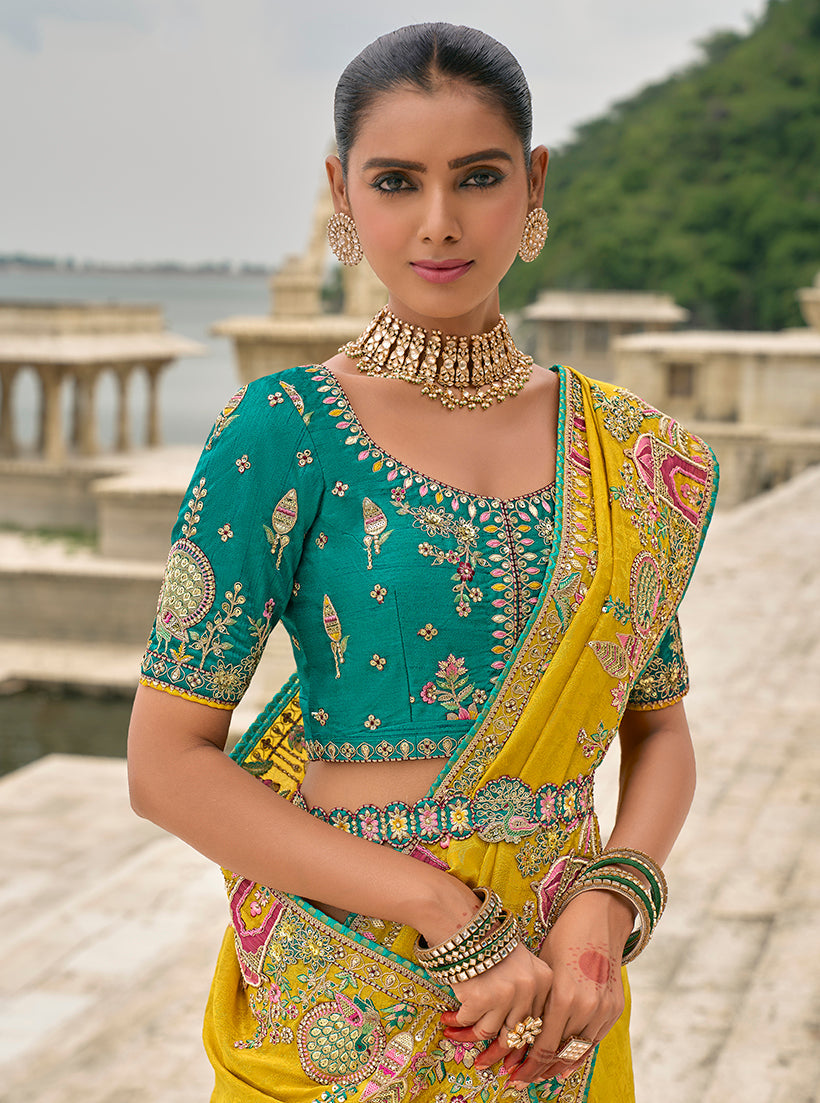 Monjolika Fashion Yellow Color Banarasi Silk Blend Embroidered With Heavy Patchwork Border Saree With Contrast Blouse | Swadesiicart