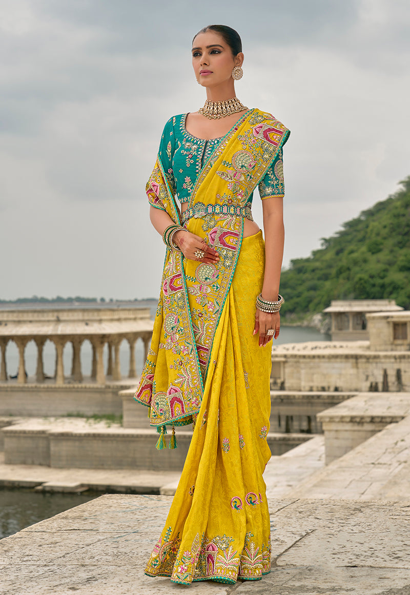 Monjolika Fashion Yellow Color Banarasi Silk Blend Embroidered With Heavy Patchwork Border Saree With Contrast Blouse | Swadesiicart