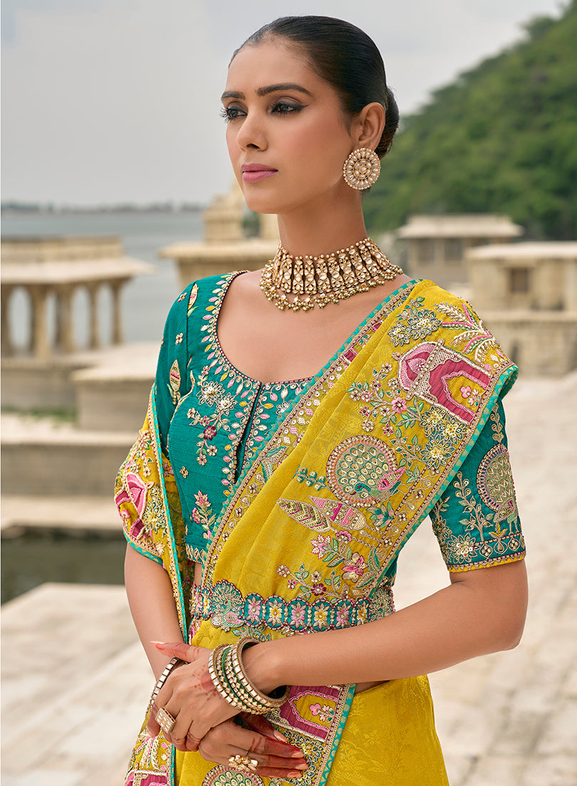 Monjolika Fashion Yellow Color Banarasi Silk Blend Embroidered With Heavy Patchwork Border Saree With Contrast Blouse | Swadesiicart