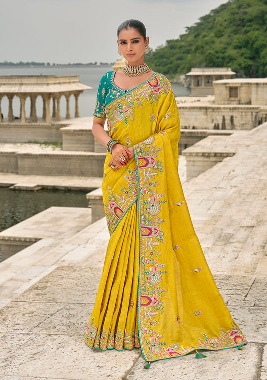 Monjolika Fashion Yellow Color Banarasi Silk Blend Embroidered With Heavy Patchwork Border Saree With Contrast Blouse | Swadesiicart