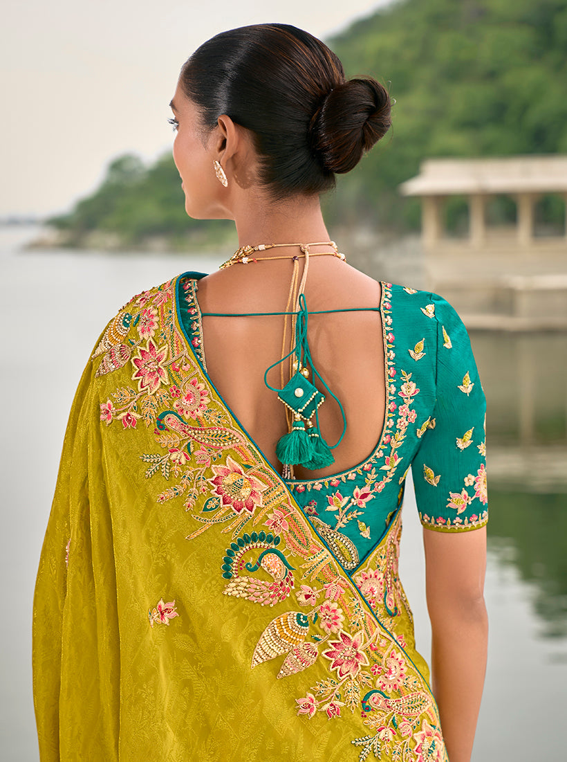 Monjolika Fashion Pear Color Banarasi Silk Blend Sequin Embroidered With Heavy Patchwork Border Saree | Swadesiicart