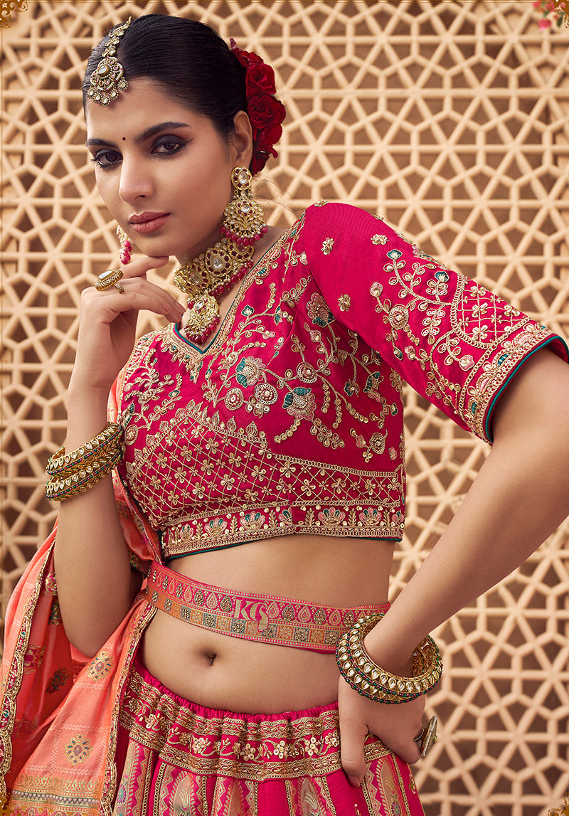 Monjolika Fashion Rani Pink & Peach Banarasi Silk Wedding Wear Lehenga With Embroidery Work | Swadesiicart