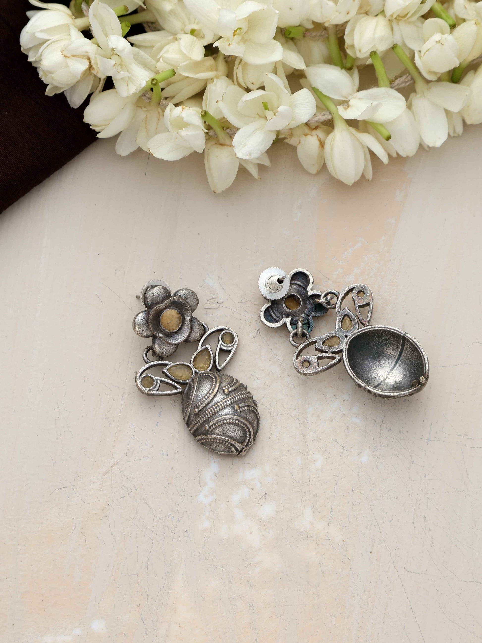 trueBrowns Silver Tone Oval Drop Earrings | Swadesiicart