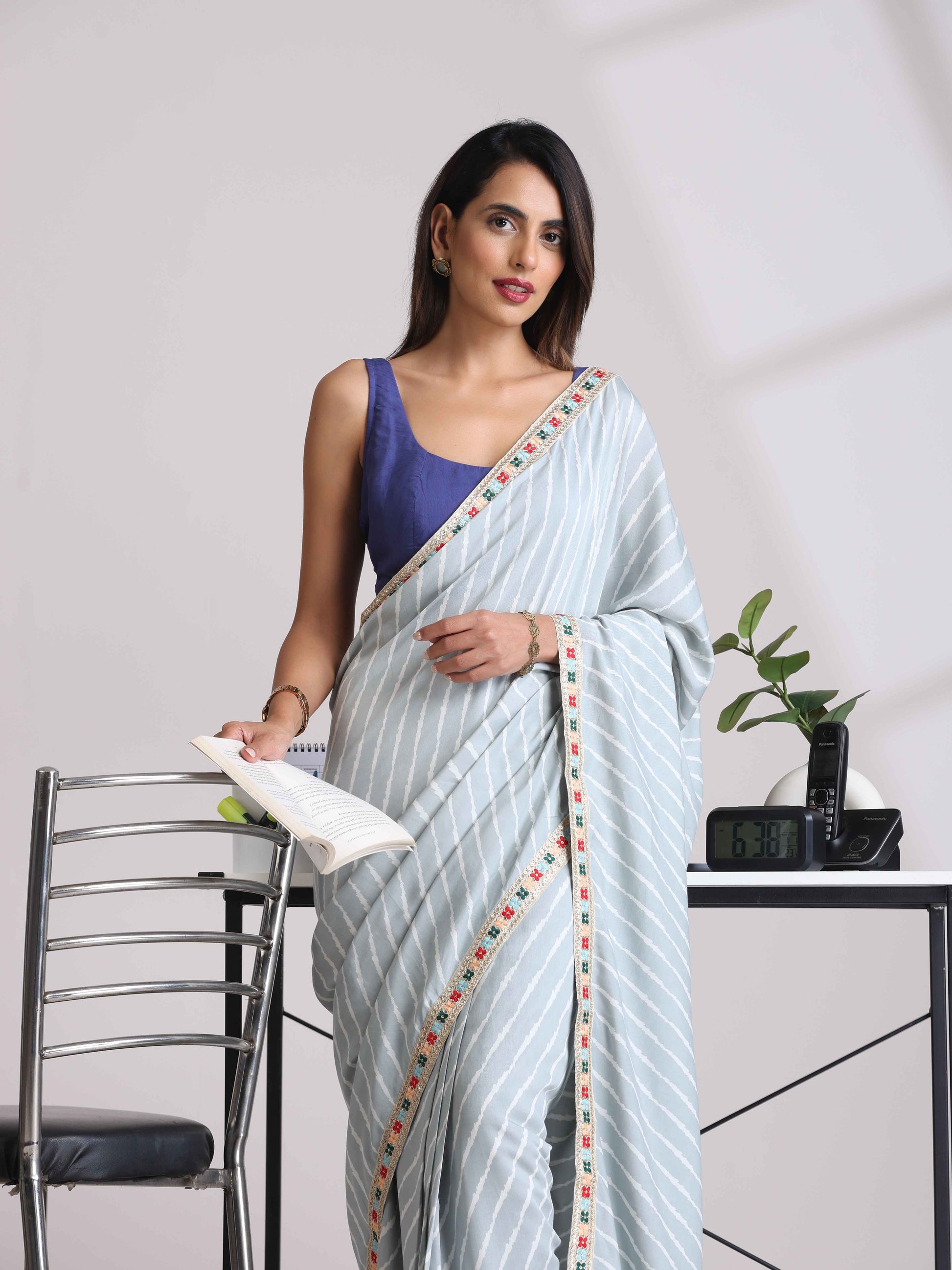 trueBrowns Blue Muslin Solid Sleeveless Blouse | Swadesiicart