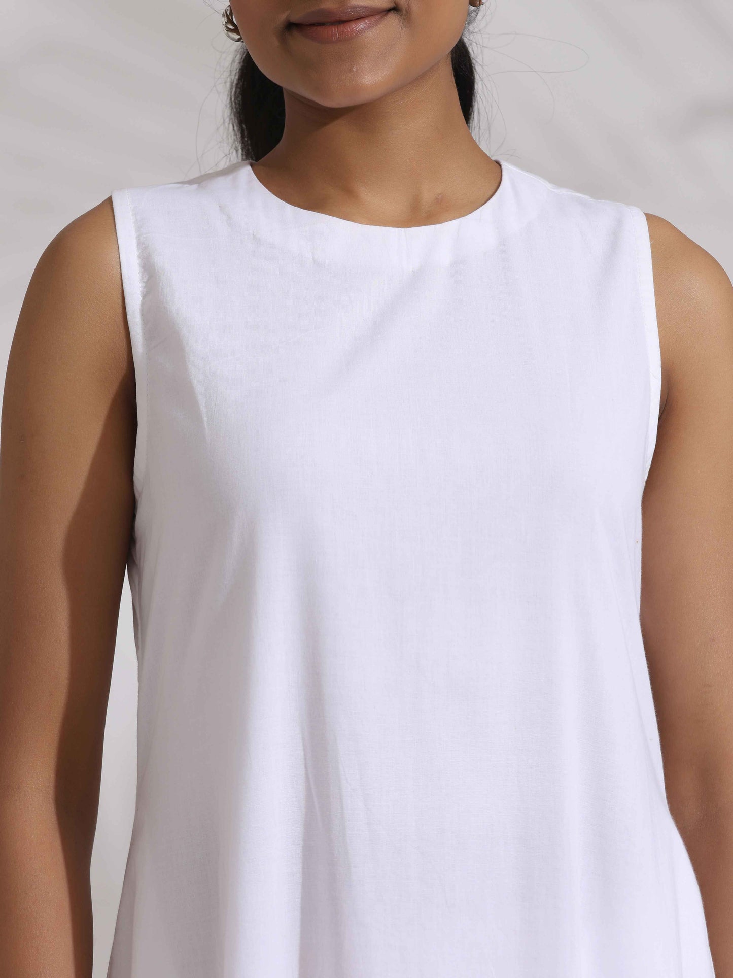 trueBrowns White Cotton Schiffli Tier Dress | Swadesiicart