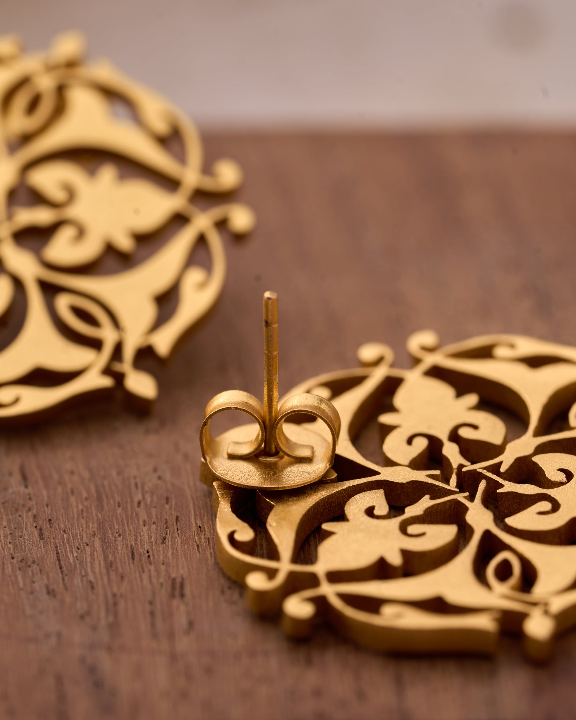 trueBrowns Gold-Polished Leaf Earrings | Swadesiicart
