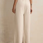trueBrowns Ivory Woollen Flared Pants | Swadesiicart
