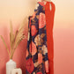 InWeave Women's Marmalade Orange Neck Patti Halter Kurta Set Navy Floral Ge Dupatta - Swadesiicart