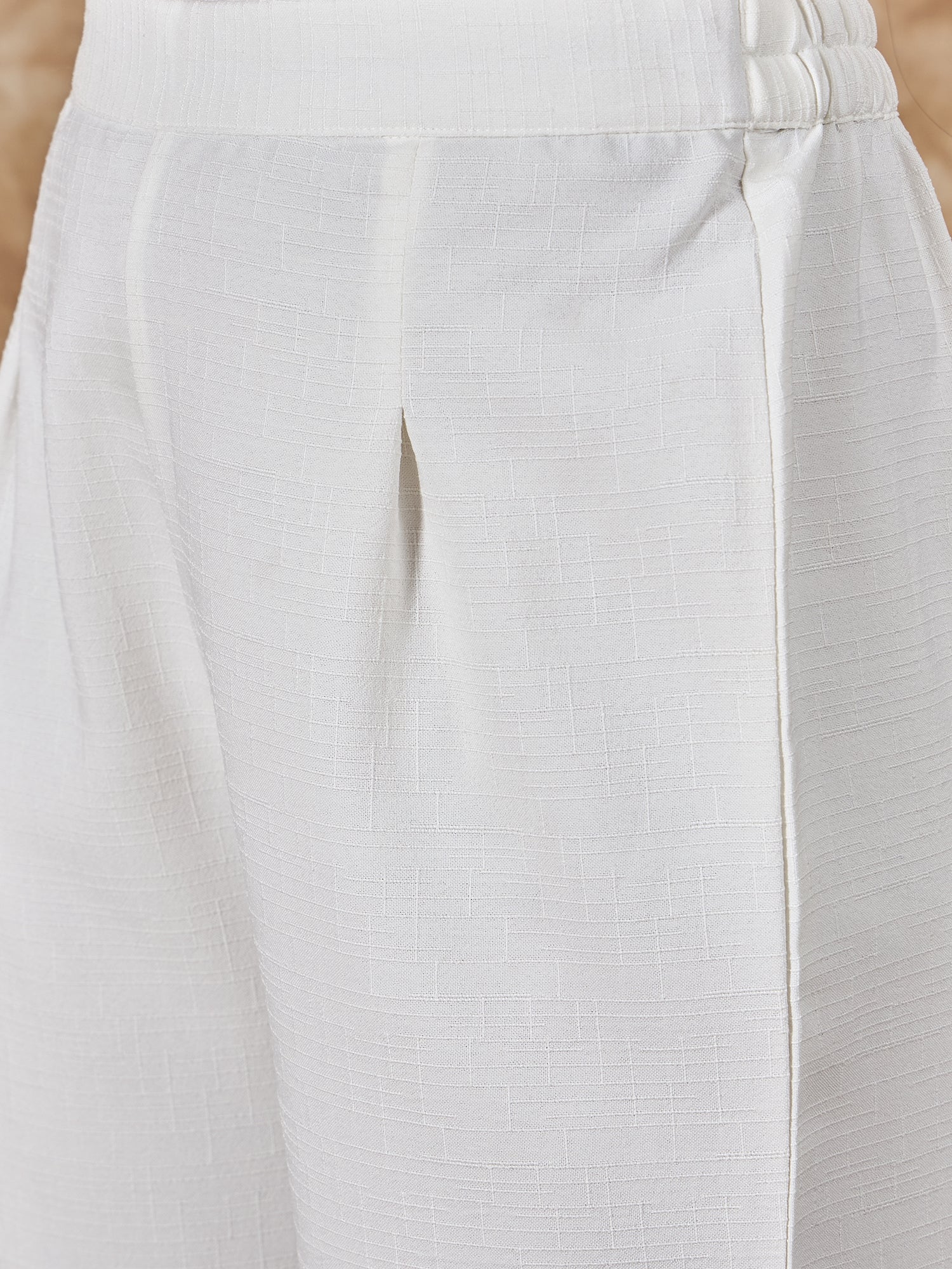 InWeave Pastel Peach Side Asymmetric Kurta Set - Swadesiicart