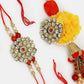 NVR Women & Men Set of 2 Red & Gold-Toned Stone-Studded & Beaded Bhaiya Bhabhi Rakhi With Roli Chawal & Chocolate | Swadesiicart