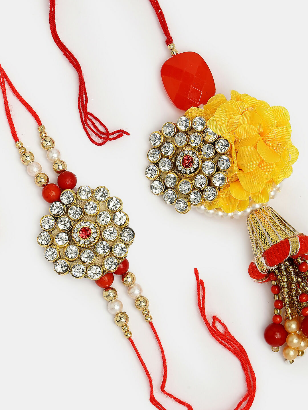 NVR Women & Men Set of 2 Red & Gold-Toned Stone-Studded & Beaded Bhaiya Bhabhi Rakhi With Roli Chawal & Chocolate | Swadesiicart