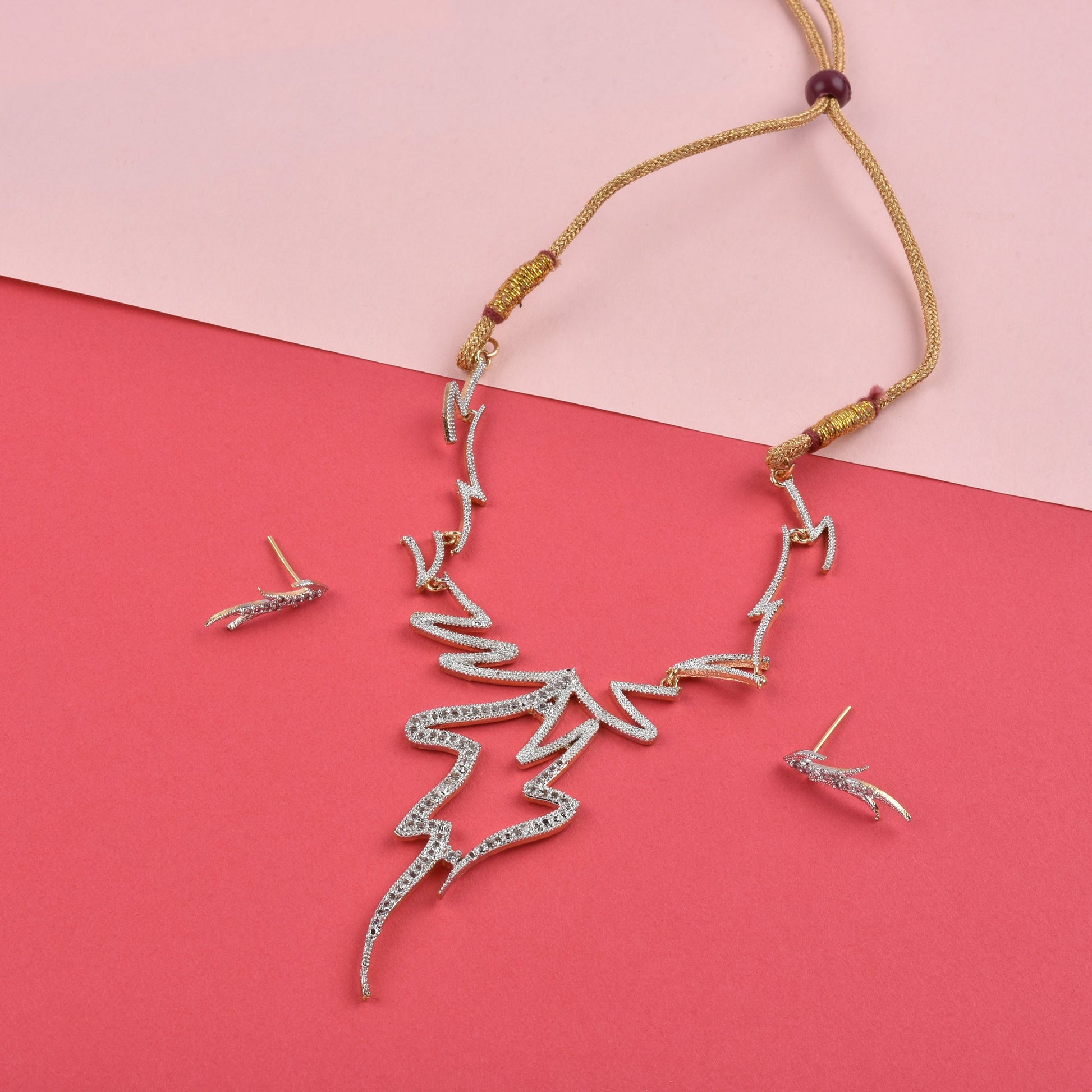 Rhodium-Plated Alloy Assymetric Designer Ad Necklace Set - The Pari - The Pari - Dinesh Associates
