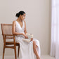 trueBrowns White Slub Texture Sleeveless Wrap Dress | Swadesiicart