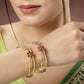NVR Women's Set of 2 Gold-Polished Artificial Stones Handcrafted Traditional Bangles - Swadesiicart