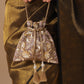 Masq Gold-Toned Embellished Potli Clutch - Swadesiicart