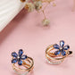 Shining Diva Rose Gold-Polished Blue Floral Studs Earrings - Swadesiicart