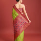 Monjolika Fashion Exquisite Designs With This Regal Parrot Green Patola Pallu Banarasi Tissue Silk Saree | Swadesiicart