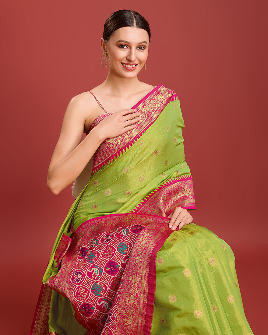 Monjolika Fashion Exquisite Designs With This Regal Parrot Green Patola Pallu Banarasi Tissue Silk Saree | Swadesiicart