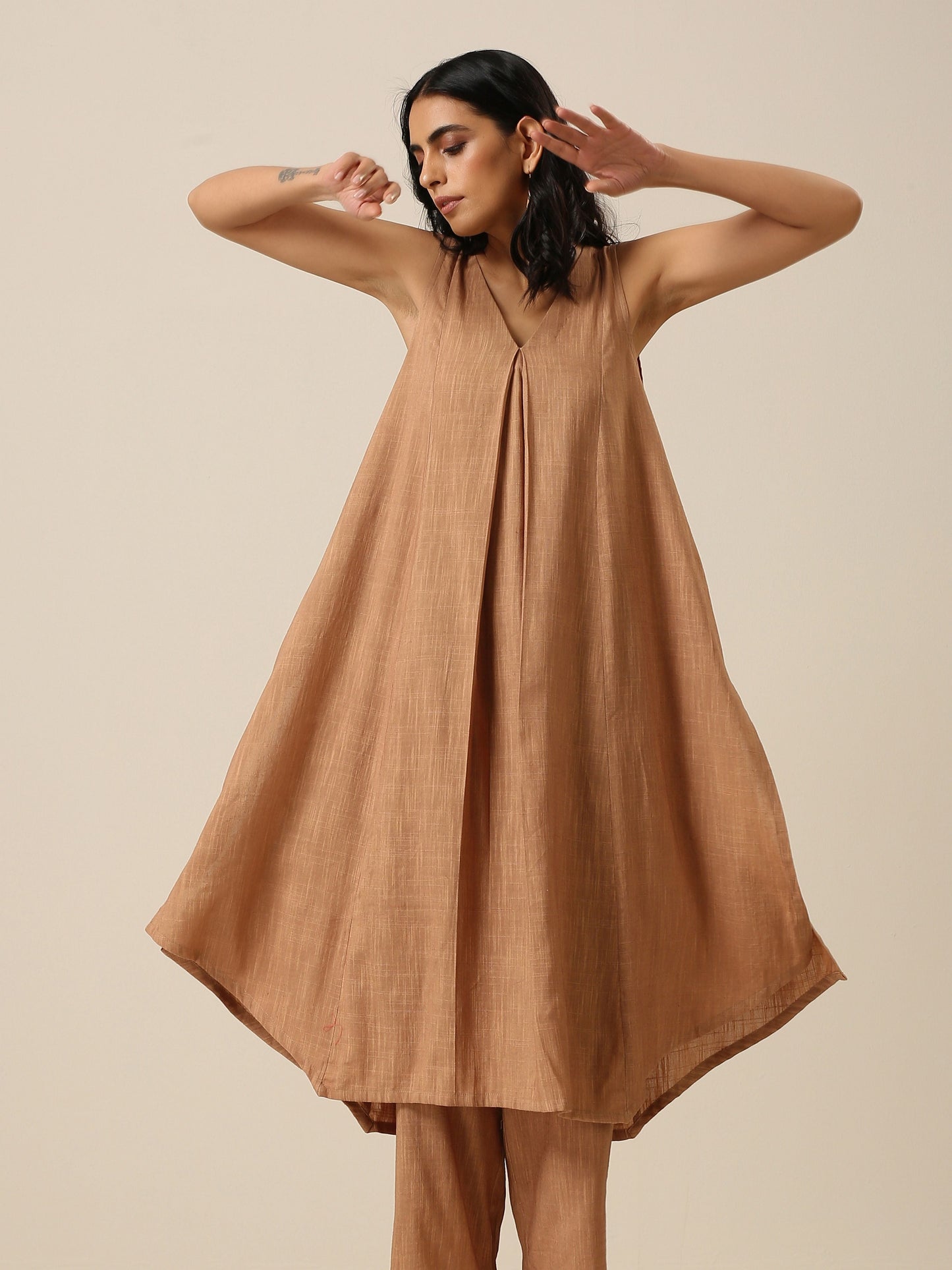 trueBrowns Beige Slub Texture Sleeveless Flared Kurta Pant Set | Swadesiicart