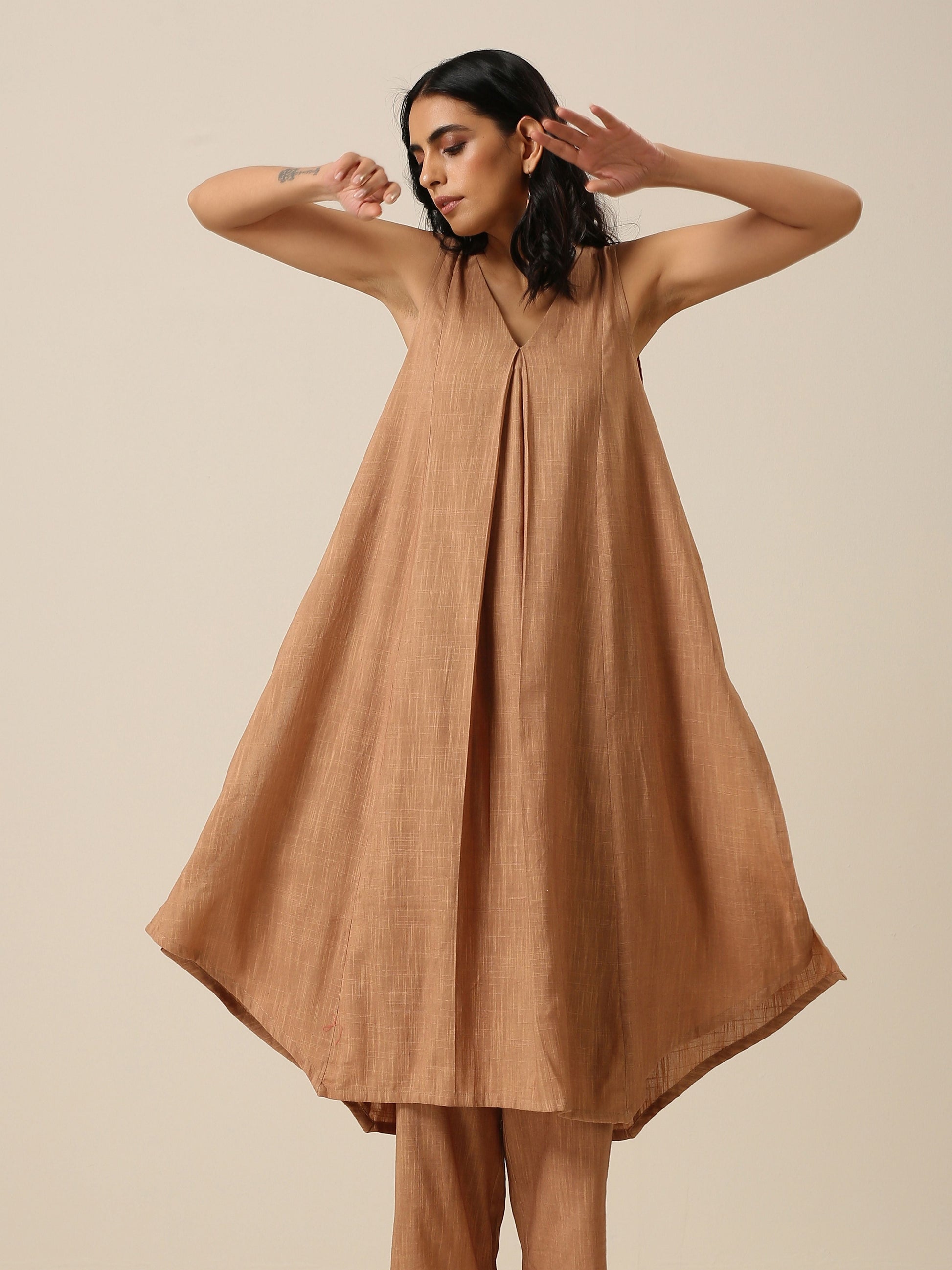 trueBrowns Beige Slub Texture Sleeveless Flared Kurta Pant Set | Swadesiicart