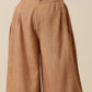 trueBrowns Beige Slub Texture Sleevesless Jacket Pant Set | Swadesiicart