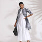 trueBrowns White Cotton Schiffli Tier Dress | Swadesiicart