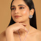 Nuyug Rhodium-Plated Zircon Studded Floral Statement Stud Earrings | Swadesiicart