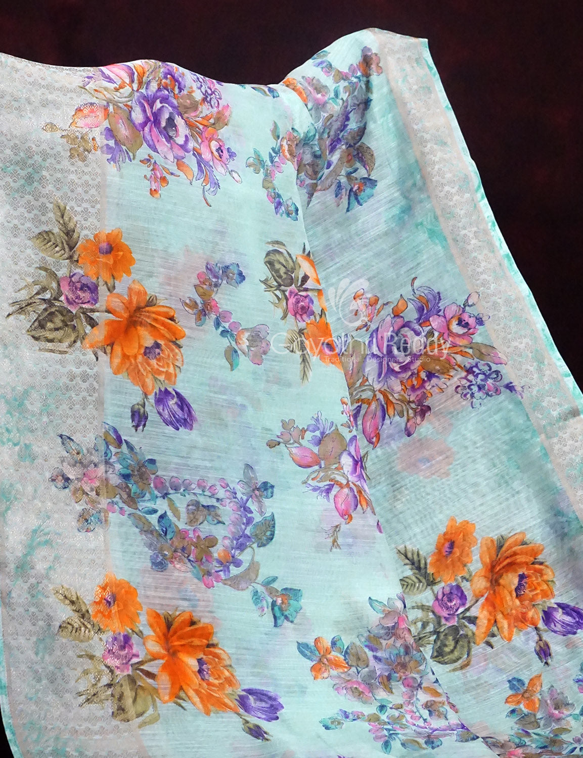 Shades of Sky Blue With Orange Blouse Floral Design Semi Chanderi Saree By Gayathri Reddy Designer Studio | Swadesiicart