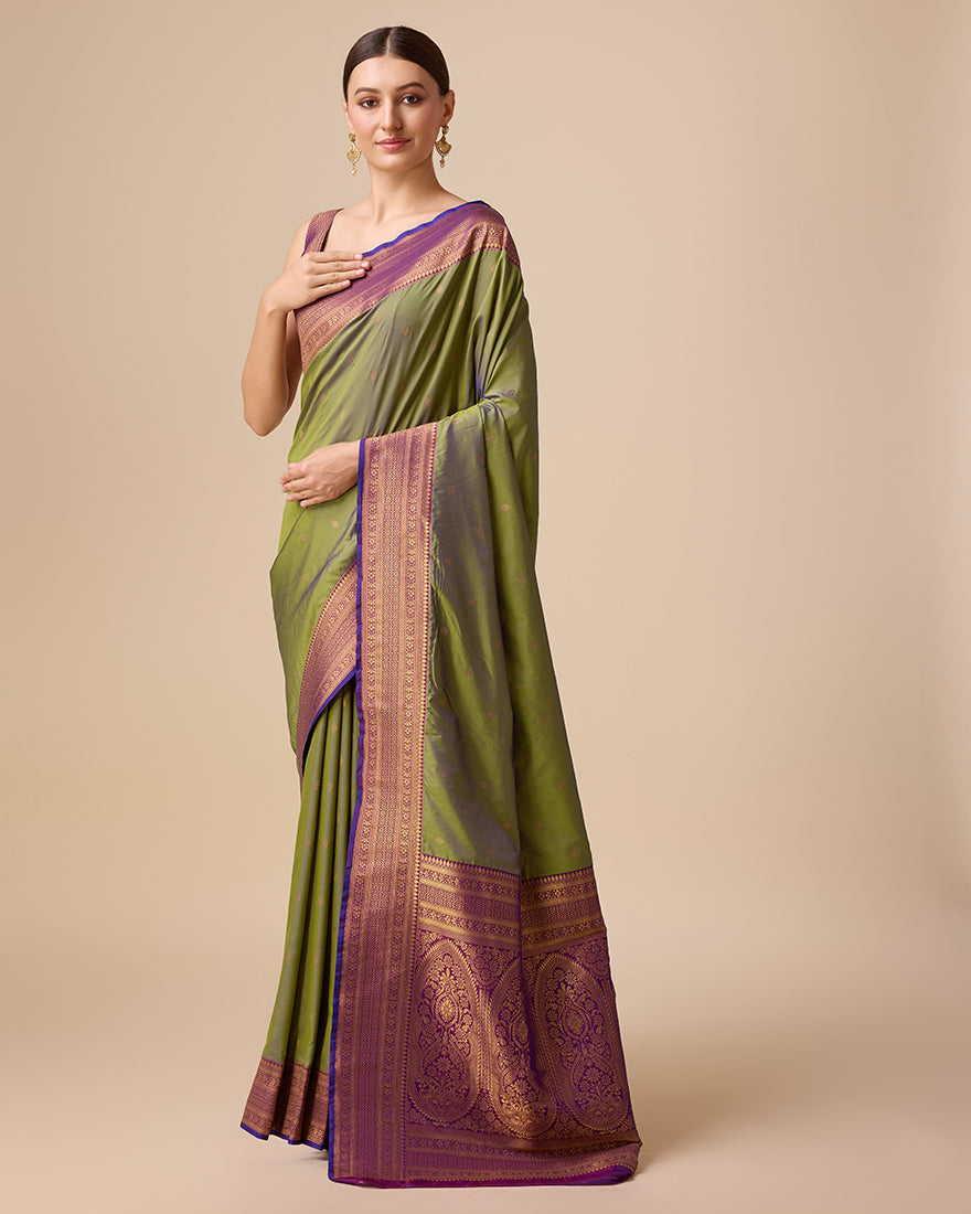 Monjolika Fashion Elegant Olive Green Banarasi With Intricate Zari Work With Rich Brocade Patterns Silk Saree | Swadesiicart