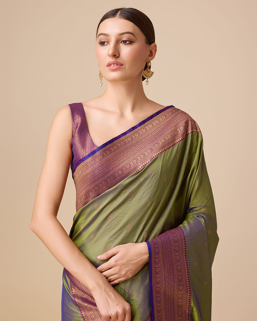Monjolika Fashion Elegant Olive Green Banarasi With Intricate Zari Work With Rich Brocade Patterns Silk Saree | Swadesiicart