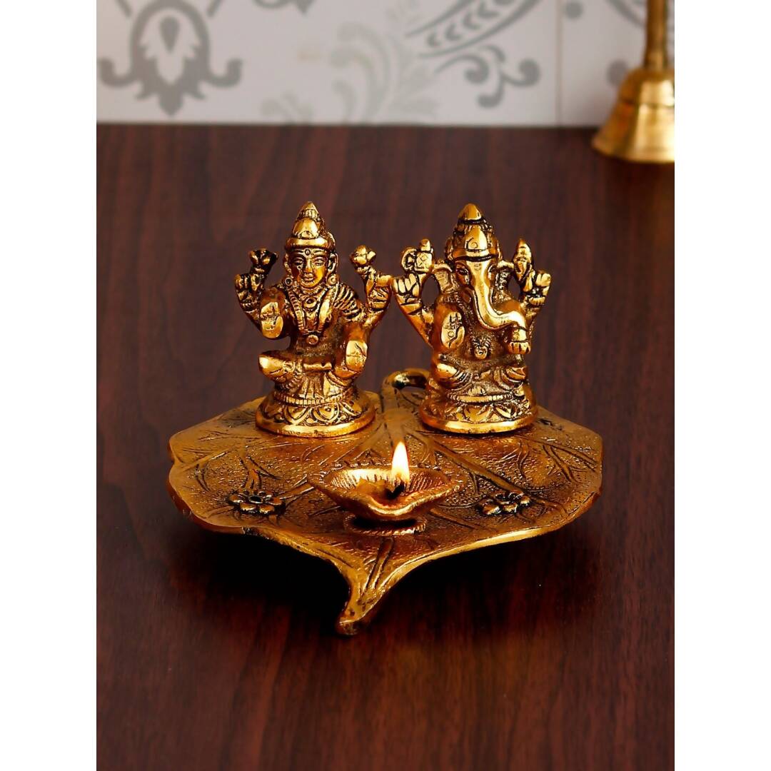 eCraftIndia Antique Gold-Toned Metal Handcrafted Laxmi Ganesh With Diya On Leaf | Swadesiicart