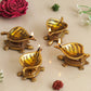 eCraftIndia 4 Pieces Beige Tortoise Statue Leaf Design Diyas | Swadesiicart