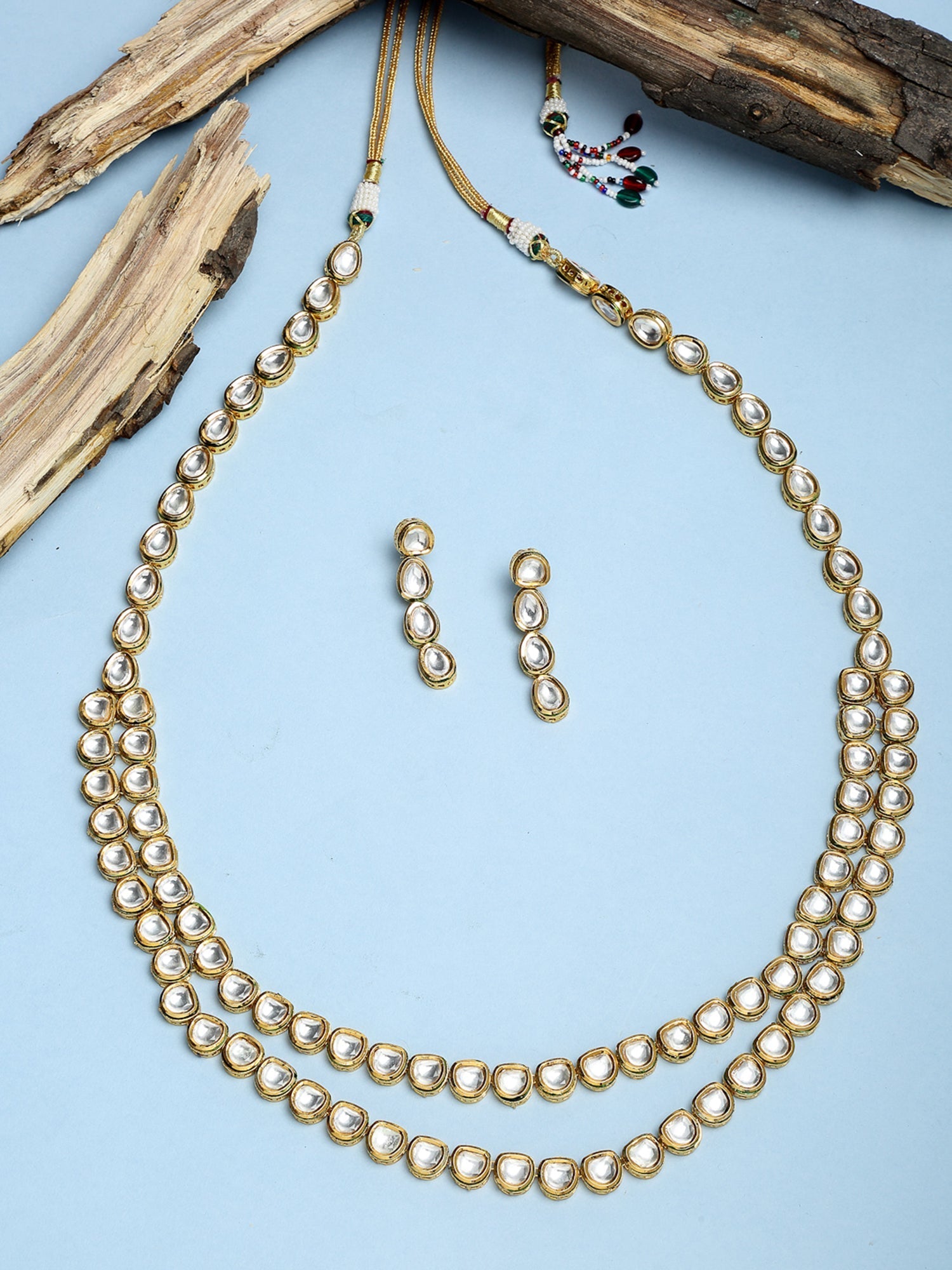 Gold-Polished Long Kundan Neckpiece With Earrings - Ruby Raang - Swadesiicart