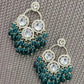 Jewel City Luxurious Polki Diamond and Rama Green Chandelier Earrings | Swadesiicart