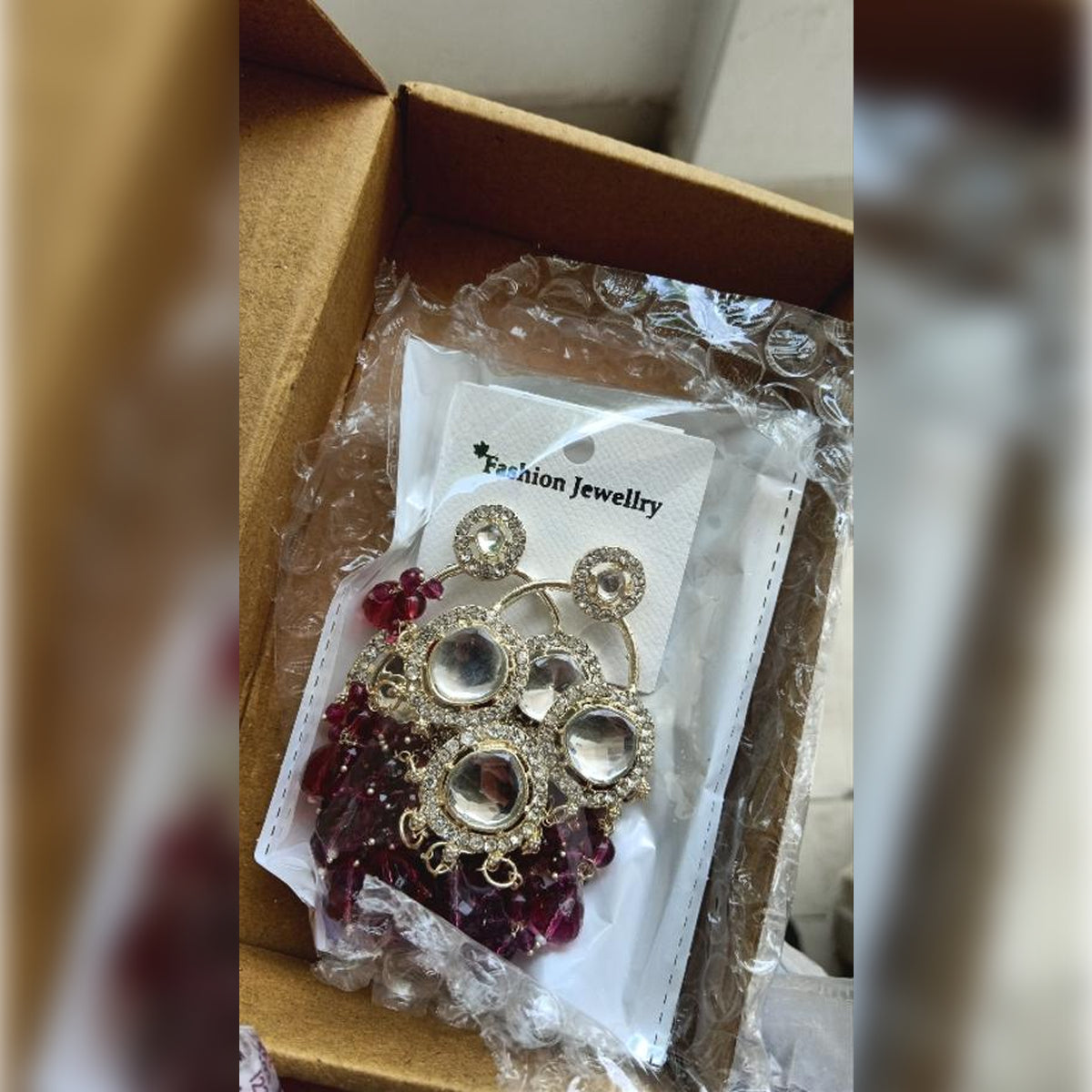 Jewel City Luxurious Polki Diamond and Wine Chandelier Earrings | Swadesiicart