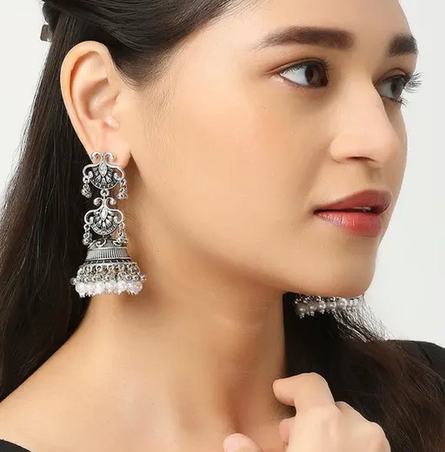 Jewel City Vintage Oxidized Silver Jhumka Earrings with Pearl and Red Bead Accents | Swadesiicart