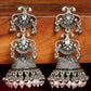Jewel City Vintage Oxidized Silver Jhumka Earrings with Pearl and Red Bead Accents | Swadesiicart