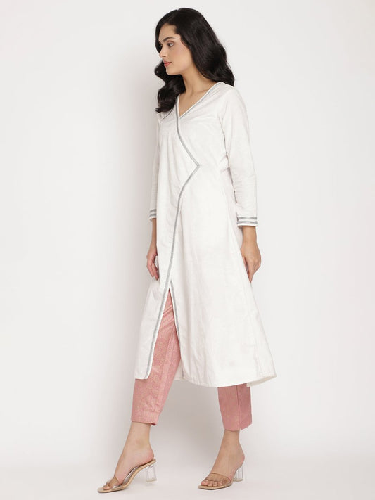 Ahalyaa Women's White Solid Velvet Angrakha Kurta With Gold Printed Pant | Swadesiicart