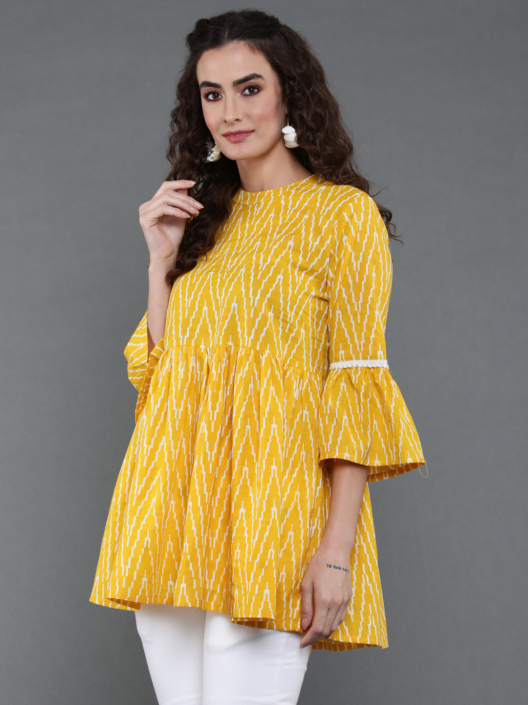 Antaran Yellow Pure Cotton Printed Tunic With Button Detail On Back - Swadesiicart
