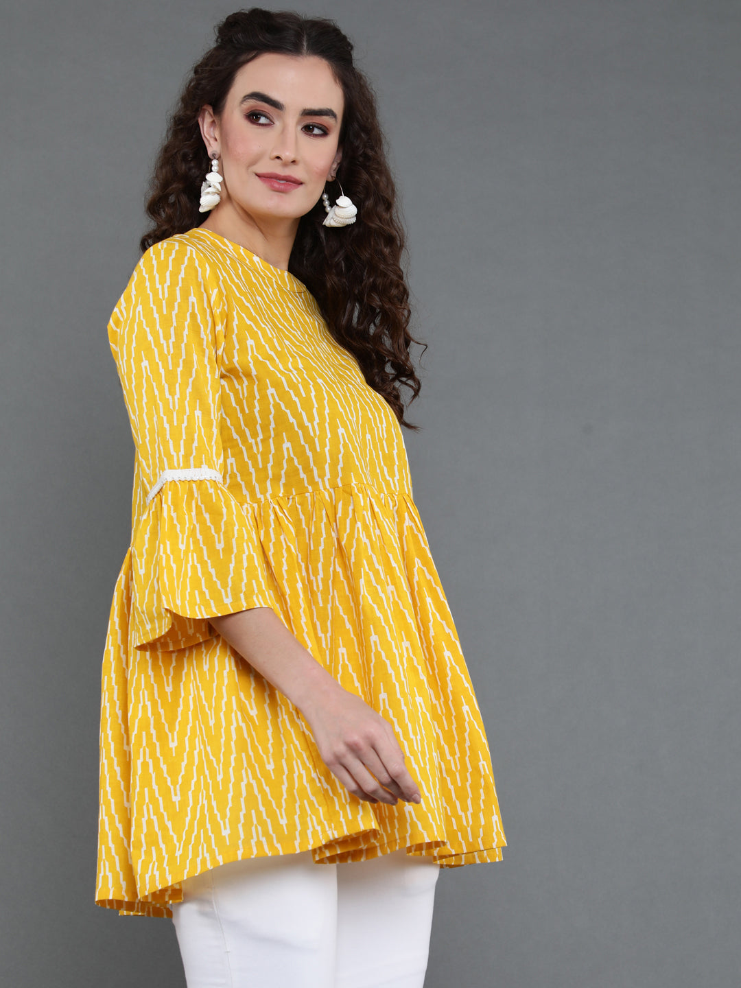 Antaran Yellow Pure Cotton Printed Tunic With Button Detail On Back - Swadesiicart