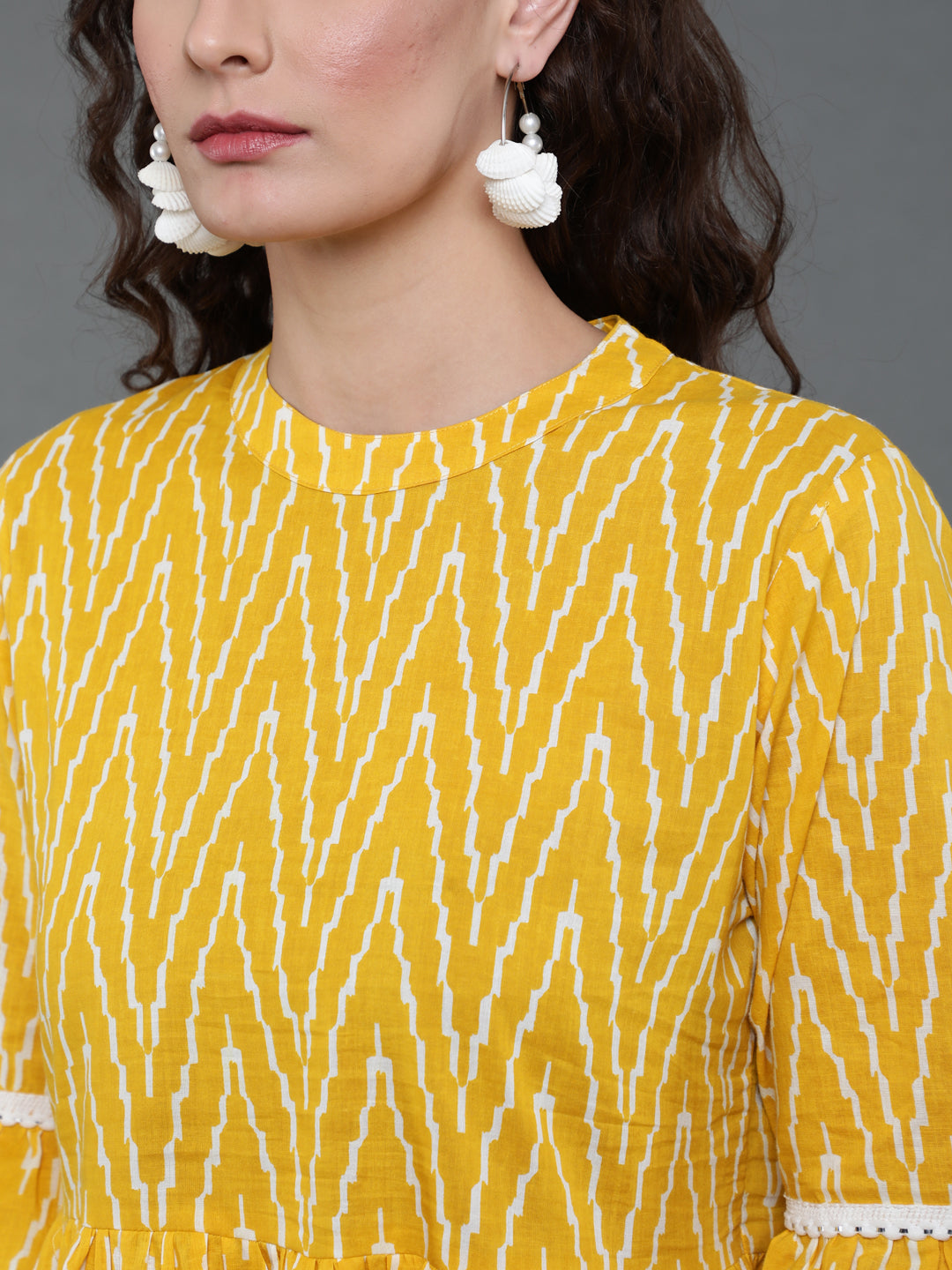 Antaran Yellow Pure Cotton Printed Tunic With Button Detail On Back - Swadesiicart