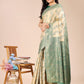 Astita Cream & Green Banarasi silk Woven Zari Work Traditional Tassel Saree | Swadesiicart