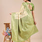 Astita Cream & Light Green Banarasi silk Woven Zari Work Traditional Tassel Saree | Swadesiicart