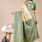 Astita Cream & Green Banarasi silk Woven Zari Work Traditional Tassel Saree | Swadesiicart