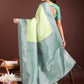 Astita Graceful Light Green & Green Banarasi Silk Saree with Rich Zari Woven Border - Traditional Elegance for Celebrations | Swadesiicart