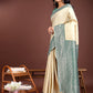 Astita Graceful Cream & Green Banarasi Silk Saree with Rich Zari Woven Border - Traditional Elegance for Celebrations | Swadesiicart