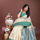 Shree Shyam Fashion Cream Lichi Silk Woven Zari Work Traditional Tassel Saree