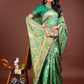 Shree Shyam Fashion Majestic Green Silk Saree with Gold Zari & Floral Design - Perfect for Festive & Traditional Occasions